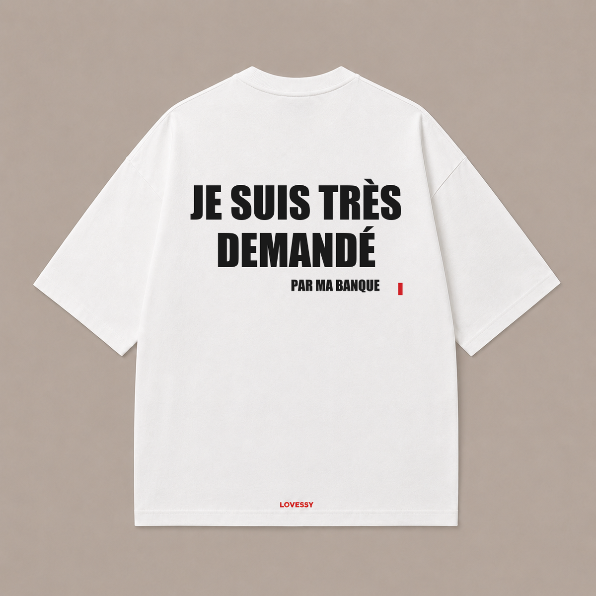 T-shirt blanc LOVESSY — JE SUIS TRÈS DEMANDÉ PAR MA BANQUE